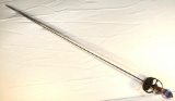 Sword...45.5 in. Cup hilt with fancy metal handle. Woven metal grip. May have been written inscripti