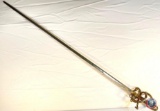 Sword...44 in. Cup hilt. Cruciform. Intricate worked metal in vegetal curves. No inscription on blad