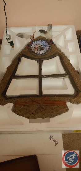 Large Arrow Head battery powered clock that has 4 inserts that are porcelain with Indian scenes on