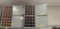 (4) metal 16 slot cabinet with door...