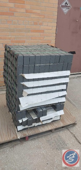 A Pallet of dark gray bricks