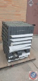 A Pallet of dark gray bricks