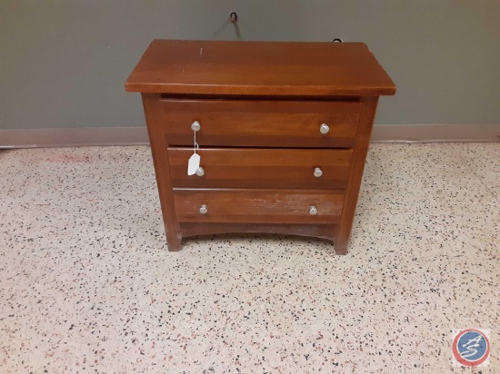 Small side table with 3 drawers, some damage on cabinet, approx measurements are: 28 x 15 x 26....