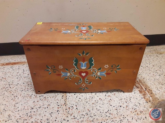 Wood Chest with decoration on it, approx measurements are: 30 x 16 x 17.5 with baskets inside....