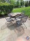 Wrought iron table with 4 chairs with 2 cushions