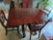 Wood Dining Room Table approx measurements are: 53 L X 42 W X 30 H, 7 Wood Chairs. Several Leaves