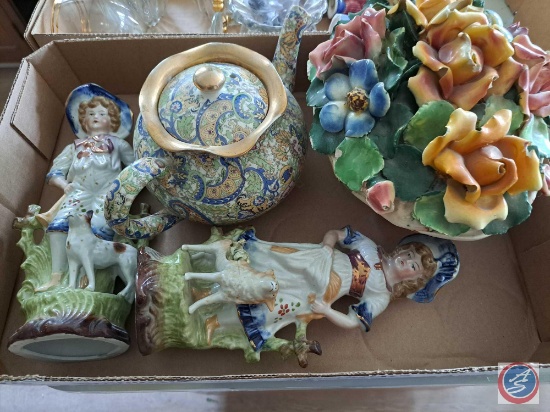 (1) Flat of Assorted Figurines, Glass Tea Pot, Blue Wine Glasses, Tomato Tea pot, Salt and Pepper