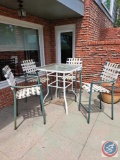 High top metal and glass table with 4 chairs...