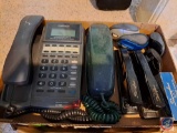 Flat containing Cortelco Phone, Wall Phone, Swingline Staplers, Computer mouses, staples. Box of