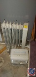 Radiator style heater and anoter smaller space heater.......