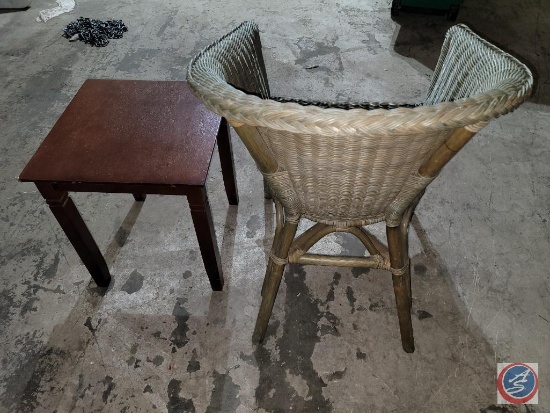 small corner table and wicker chair