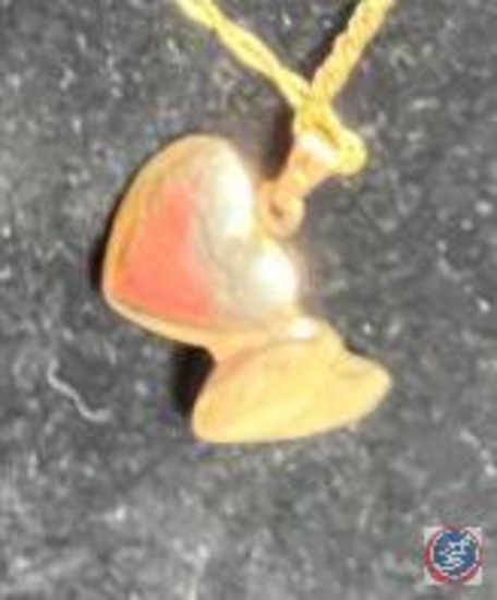 Gold tone double heart necklace