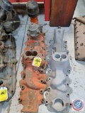 (2) single carburetor flathead Ford intake manifolds. ???????Item not available for shipping