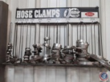 (1) hose clamp display rack with some hose clamps.