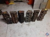 (3) sets of small block Chevy heads.