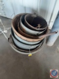 Miscellaneous oil drain pans and buckets.