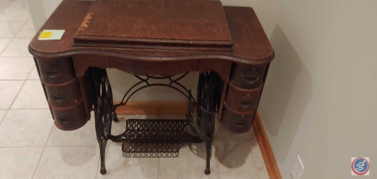 Vintage Cabinet and Sewing Machine.