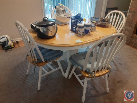 (1) table with four chairs measurements are ( 60x42x30) (contents on table not included)
