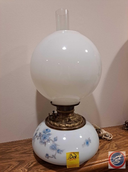 Vintage electric hurricane lamp, top globe is milk glass, the inner chimney is clear glass. Vintage