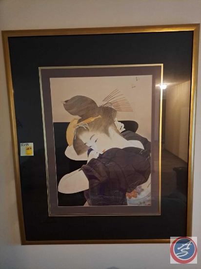 Framed Geisha portrait, in a golden colored frame. Measures at 51 inches by 45 inches.