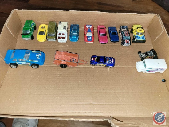 assorted metal cars, vans and truck