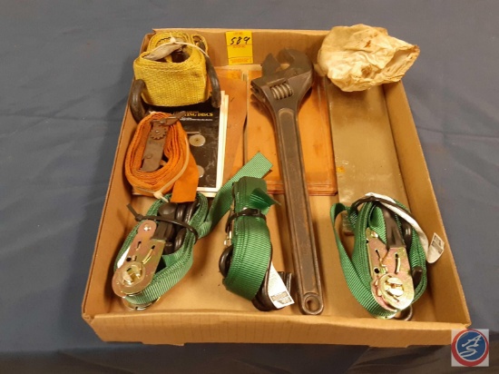 Straps, crescent wrench, mini cutting discs, small pieces of metal