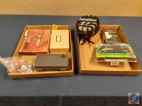 Super 4X4 St Light, Radio Shack Mulitmeter, Brother P-Touch electronic labeling system, Socket set