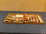 Glass cleaner, upholstery cleaner, silicone tube, hacksaw blades, cotter pin assortment, plug