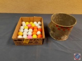 Vintage one gallon metal dry feed bucket, golf balls