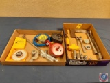 Ratchets, swivel head sockets, tape measure, T-square, chisel, magnetic protractor angle locater,