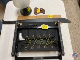 Omaha Public School Bleacher seat, NorthCrest battery powered lamp, Leather cover for single blade