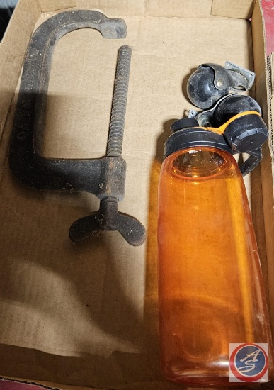 C clamp, Camelback water bottle, and castors
