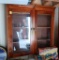 Vintage wall-hanging shelf. Has two doors and two fixed shelves. See photos for details.