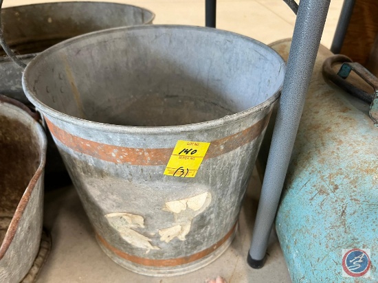 galvanized buckets (one has a whole in bottom)