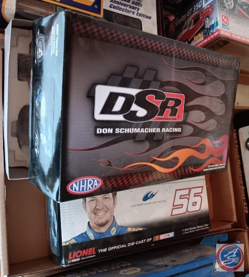 Two model cars including Martin Truex Jr. #56, and a DSR 1-24 scale NHRA Funny car collectable.