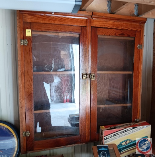 Vintage wall-hanging shelf. Has two doors and two fixed shelves. See photos for details.