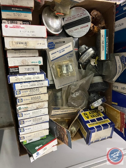 Assortment of Car Parts: Oil Seals, Transmission Parts, and Other Items