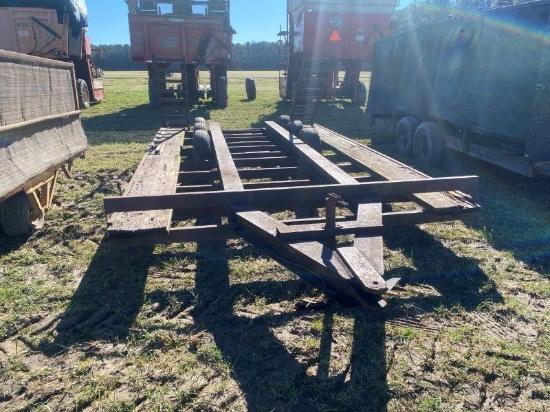 Tri axle primer trailer with ramps