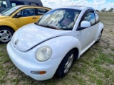 1999 white Volkswagon bug