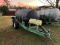 Reddick 1000-gallon nurse tank on dual axle trailer with pump and chemical mix tank