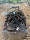 pallet of chain, cable, and pump