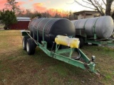 Reddick 1000-gallon nurse tank on dual axle trailer with pump and chemical mix tank