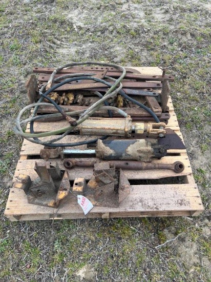 Pallet of farm items and cylinder