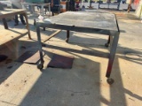 Metal table on wheels