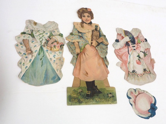 Cardboard advertising doll with paper dresses
