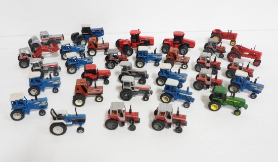 Large lot of 1/64 scale tractors & misc