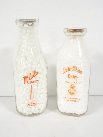 (2) 1-quart Michigan milk bottles