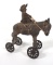 Cast iron donkey & rider pull toy