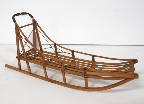 Model dog sled with foot brake