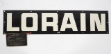 Lorain sign with brass tag